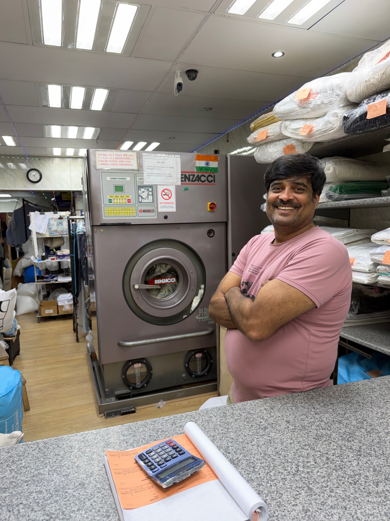 Sanjay Patel behind the counter at Supaclean Drycleaners