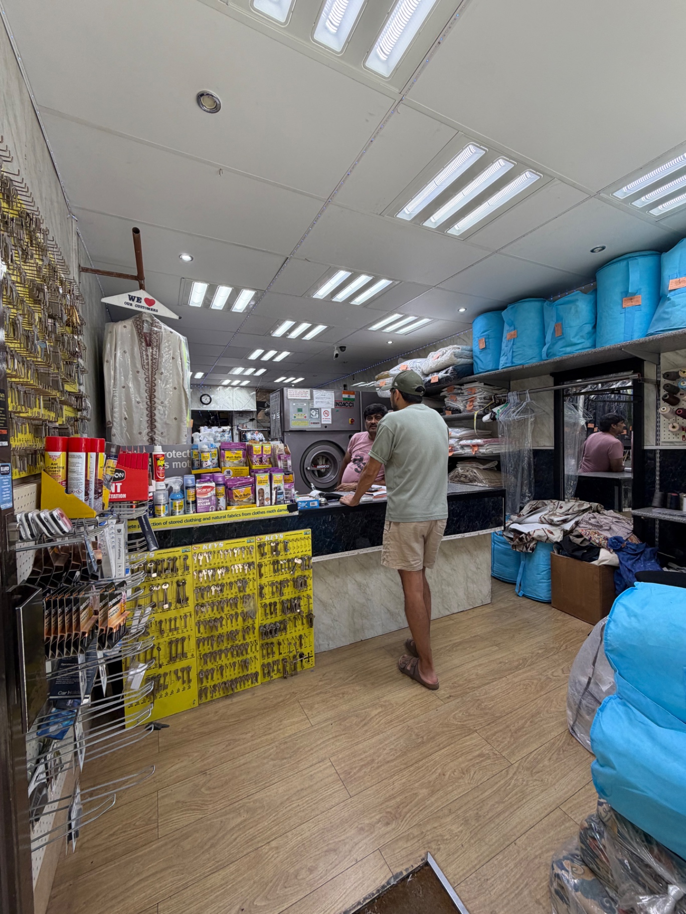 Inside Supaclean, customer at the counter